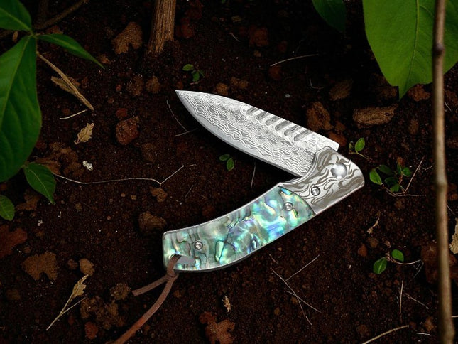 Couteau damas inox pliant