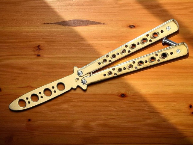 Couteau double tranchant papillon