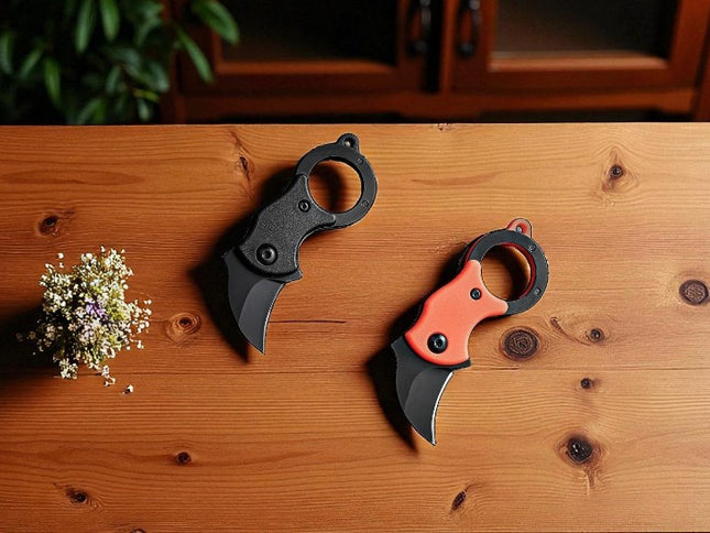 Couteau griffe pliant