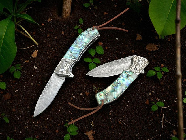 Couteau pliant damas inox