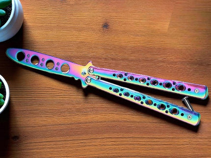 Papillon couteau a double tranchant