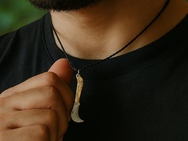 Serpette a pendentif inox